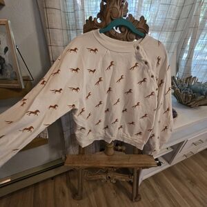 Anthropologie Cream Sweatshirt with Brown Dinosaur Design